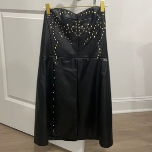 Black leather with a gold studs Armani exchange dress